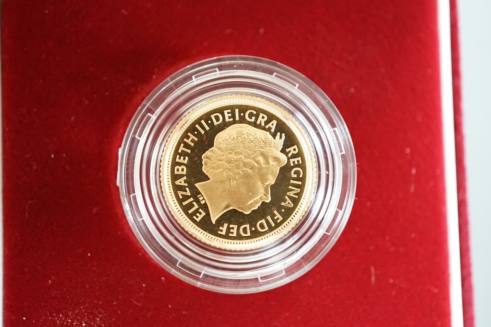 Two cased gold proof half sovereigns, 2000.